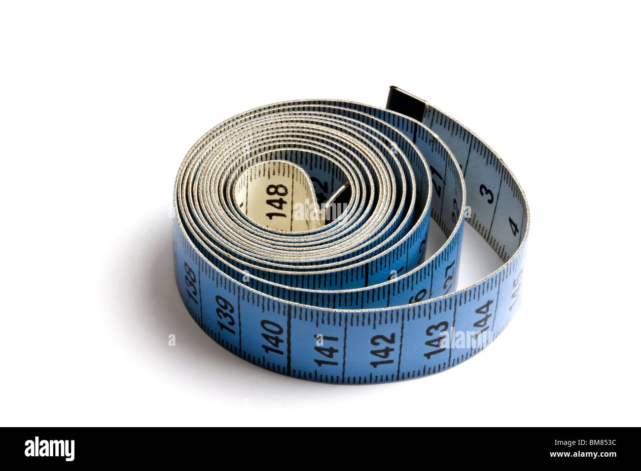 Tailors tape measure cut out against a white background. Blue