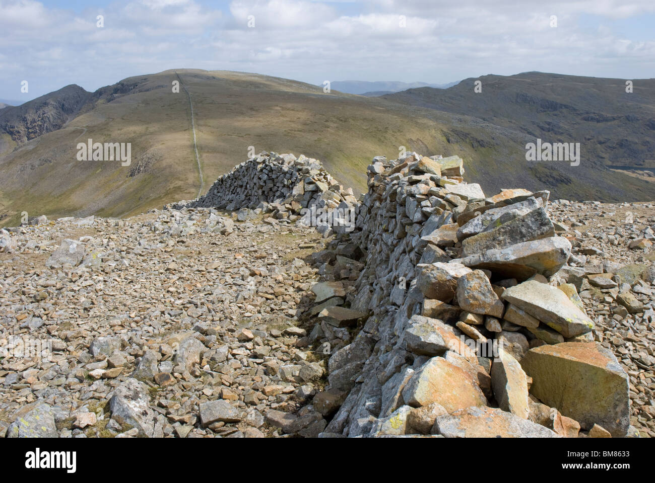 Drystone wall on Haycock and Scoat Fell in the Cumbrian Lake District. Stock Photo