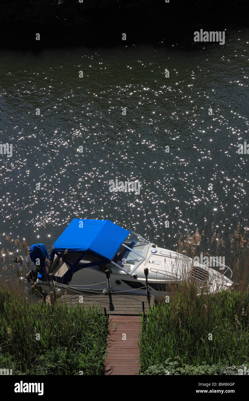 Cabin cruiser moored on the River Stour, Christchurch Stock Photo