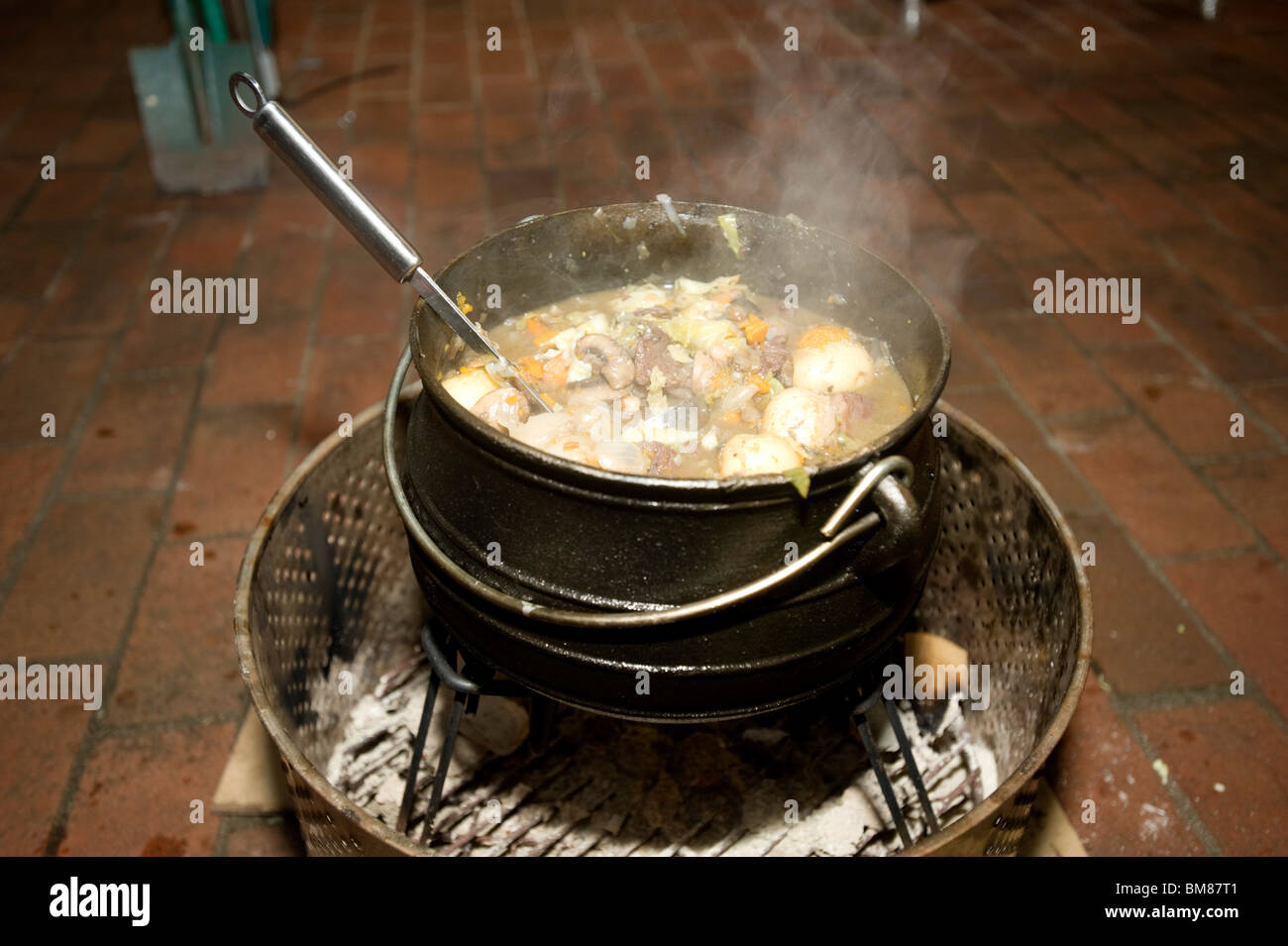 A potjiekos, or dutch oven, is used in a traditional South African