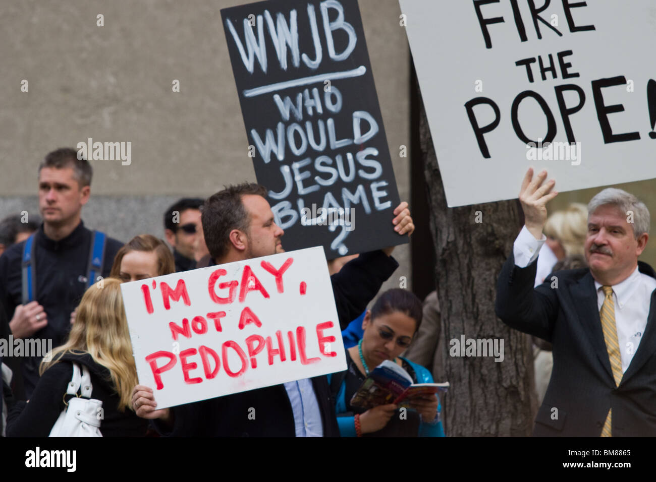 Protesters opposing the Catholic church on pedophilia opposite St. Patrick's Cathedral on Easter day 2010 Stock Photo