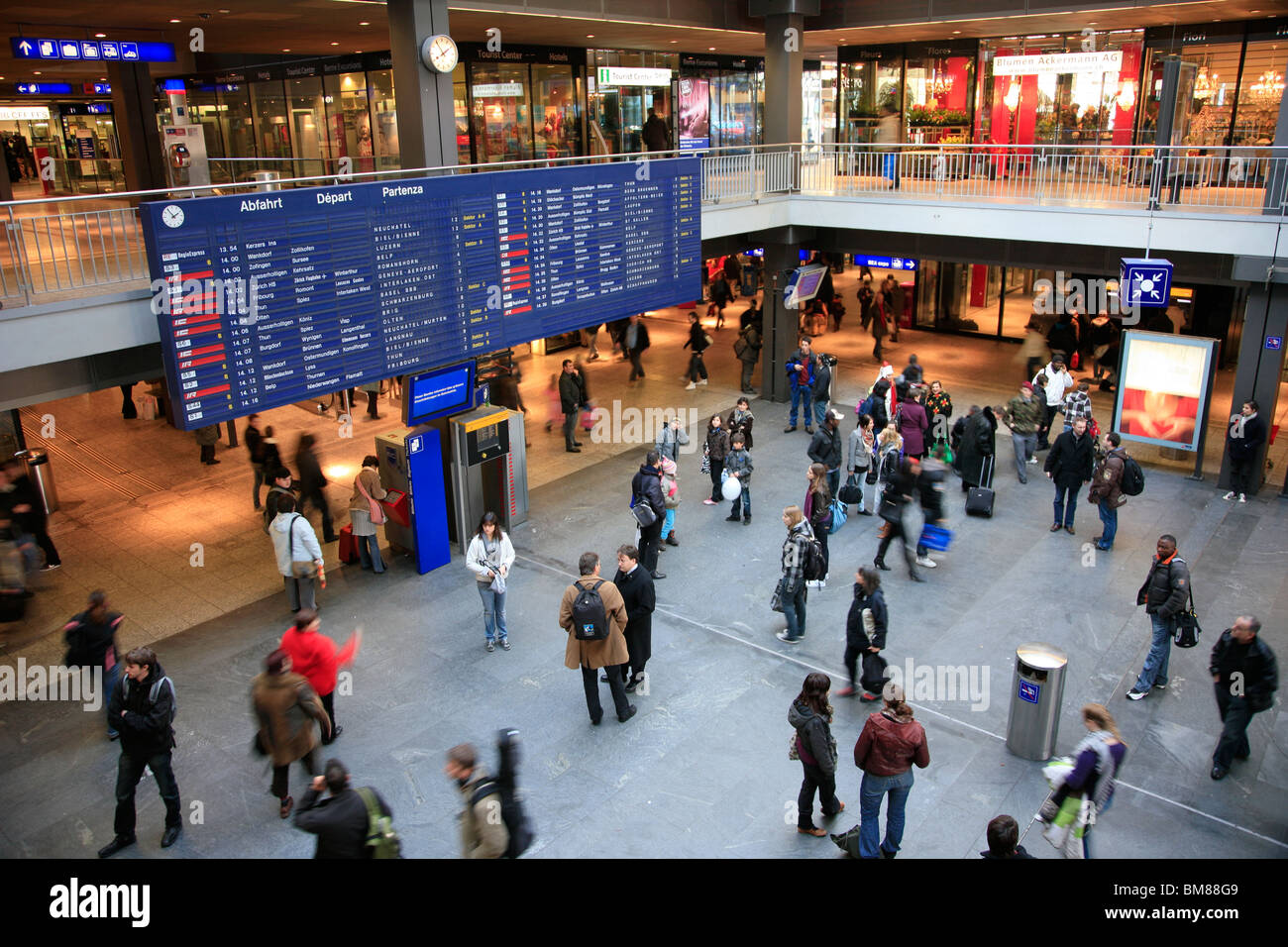 People at the departure and arrivals board in railway station of Bern capital city Switzerland Oberland county Stock Photo
