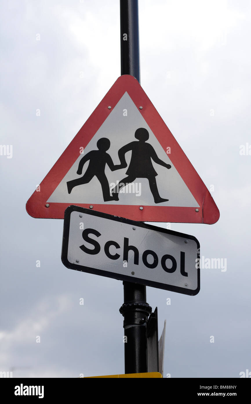 British 'school crossing ahead' warning road sign Stock Photo