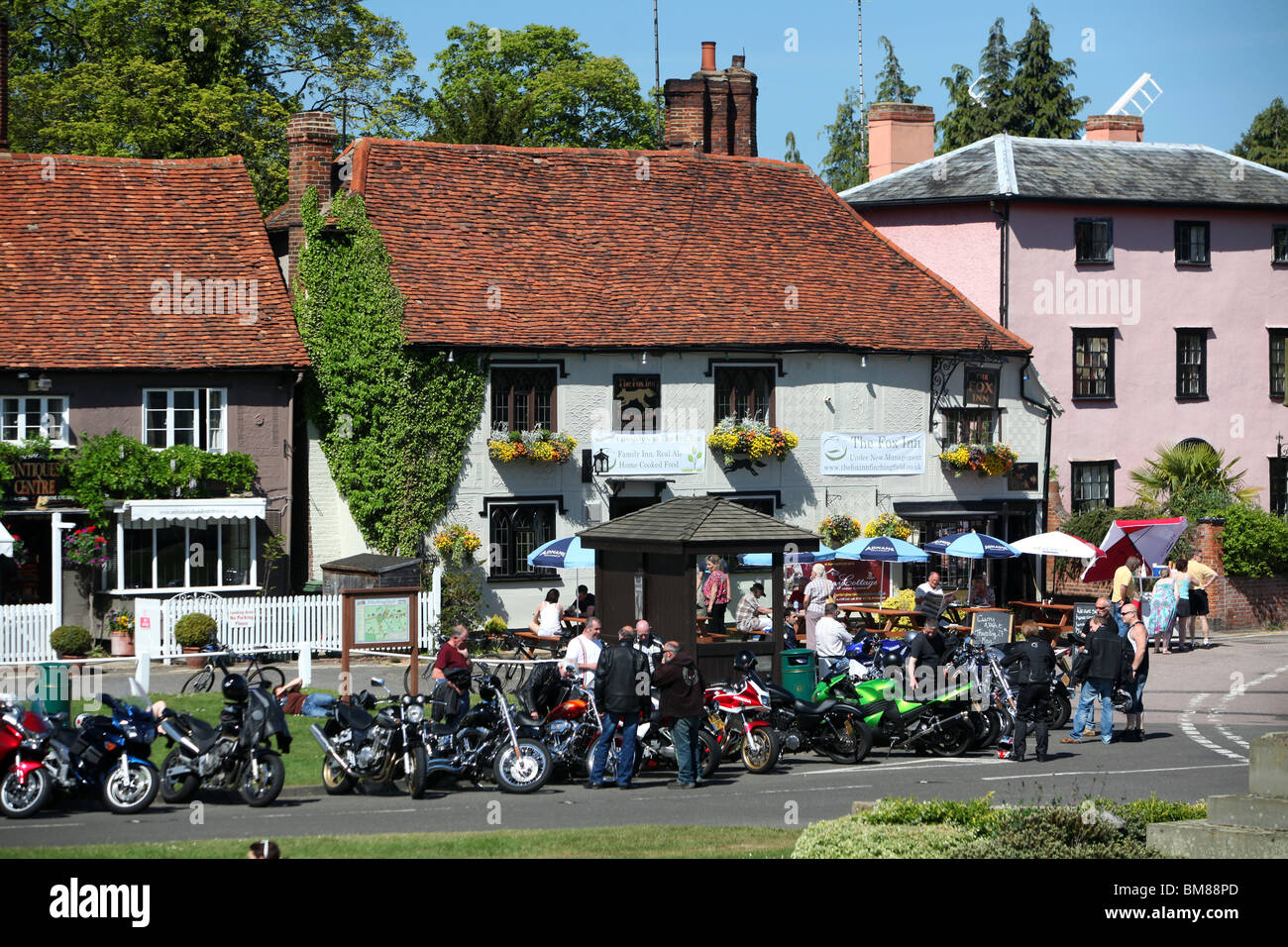 Bikers gather outside The Fox Inn pub in the picturesque village of