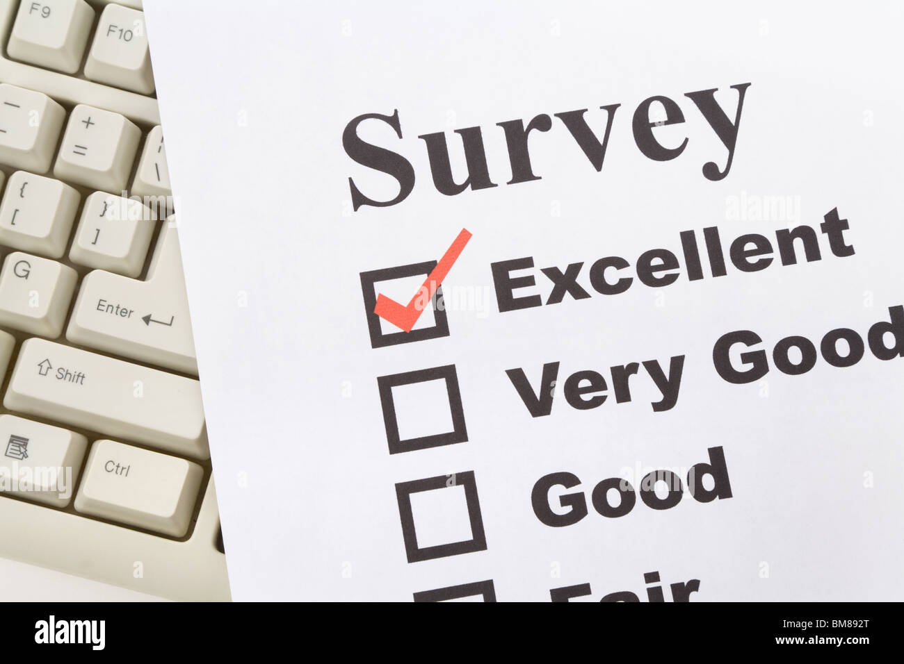 questionnaire and computer keyboard, business concept Stock Photo - Alamy