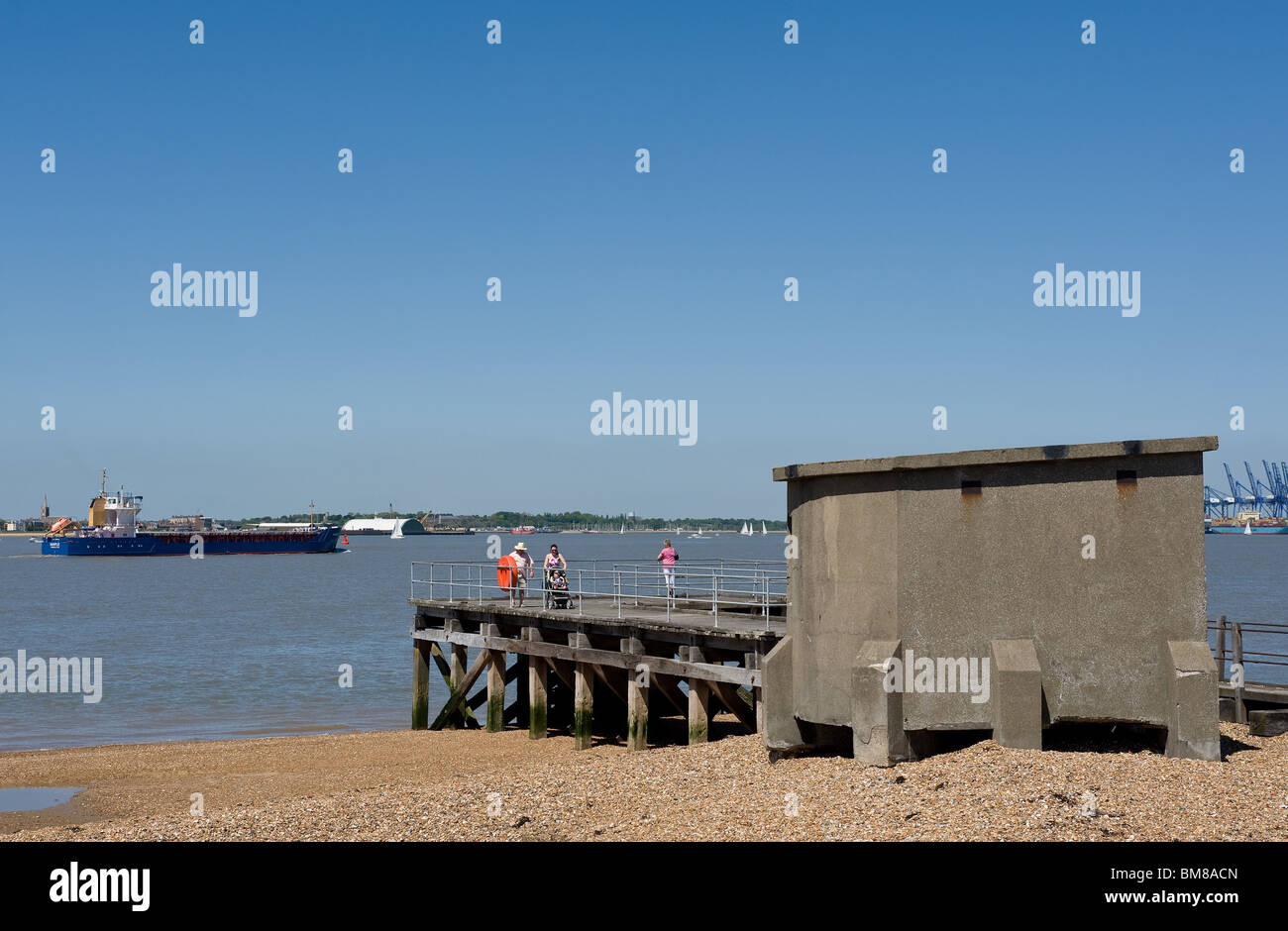 An old pier on the shore of Landguard Point near the Port of Felixstowe in Suffolk.  Photo by Gordon Scammell Stock Photo