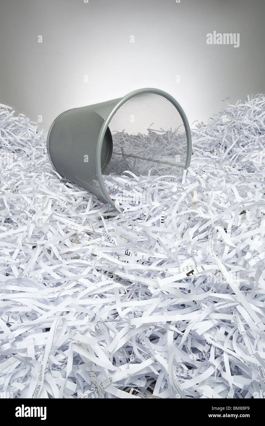 Shredded documents waste paper inside thin transparent plastic bag
