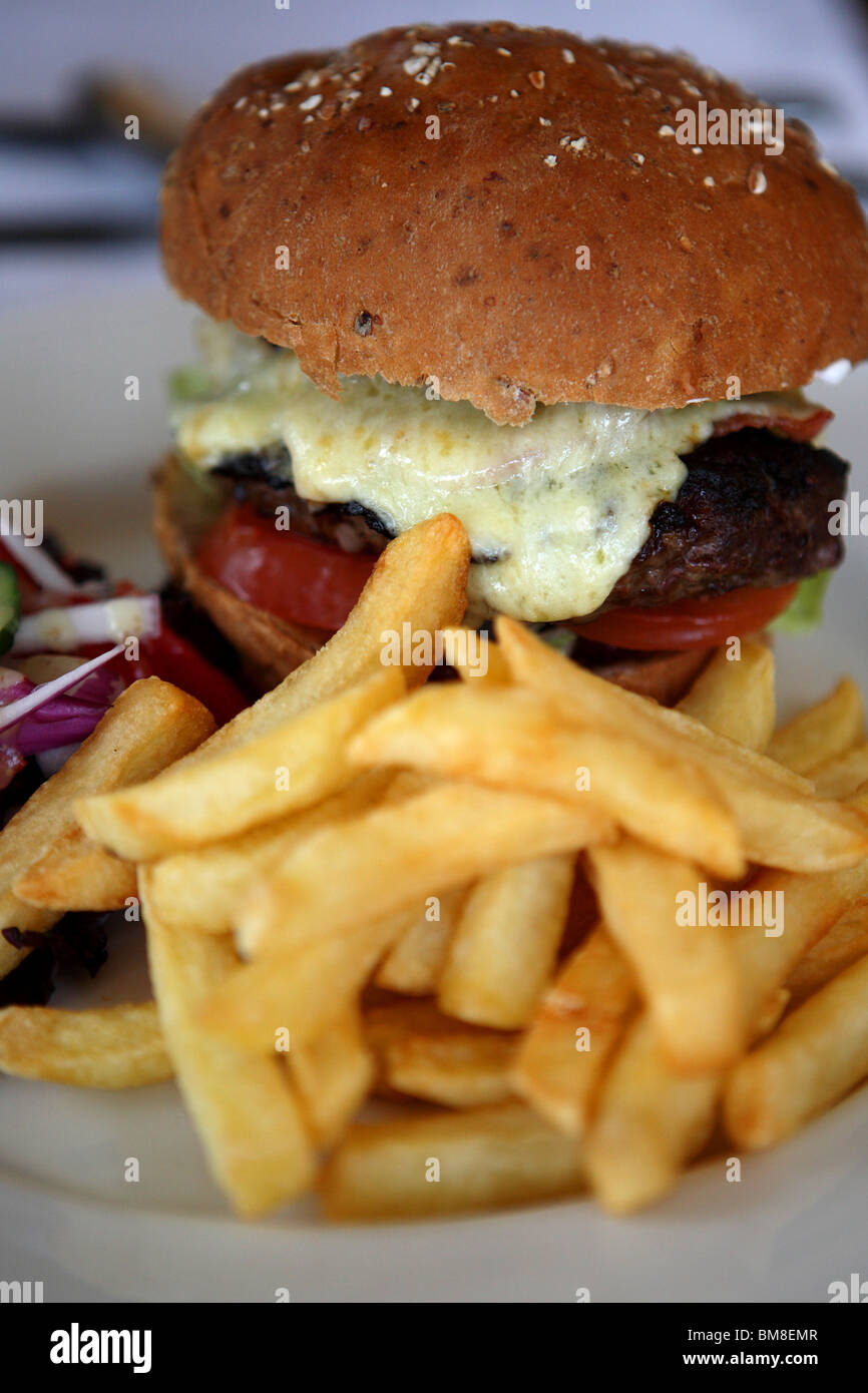 a tasty evening treat of Burger and Chips that tasted as good as it looked Stock Photo