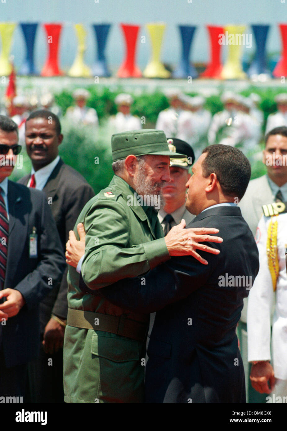 Venezuela's President Hugo Chavez, right, embraces Cuba's President Fidel Castro in Caracas' Simon Bolivar International Airport Stock Photo