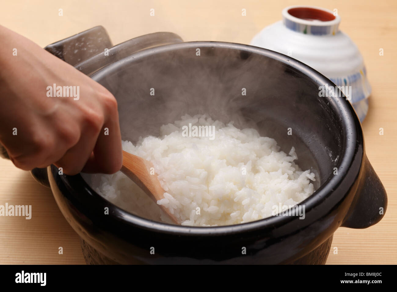 Steamed rice in a pot Stock Photo - Alamy