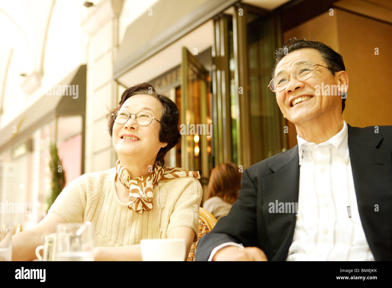 Senior men sitting table hi-res stock photography and images - Alamy