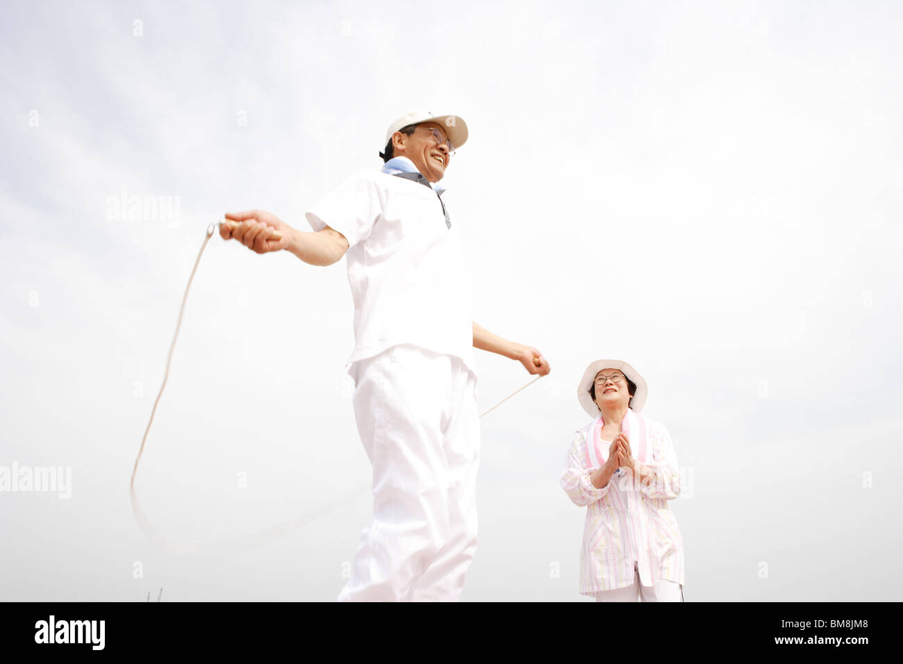 Couple jumping rope hi-res stock photography and images - Alamy