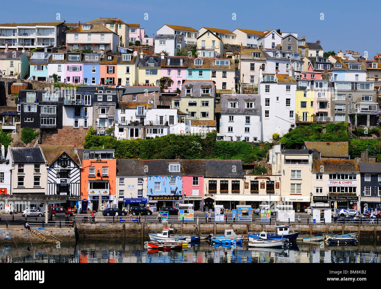colourful houses overlooking the harbour at brixham in devon, uk Stock Photo