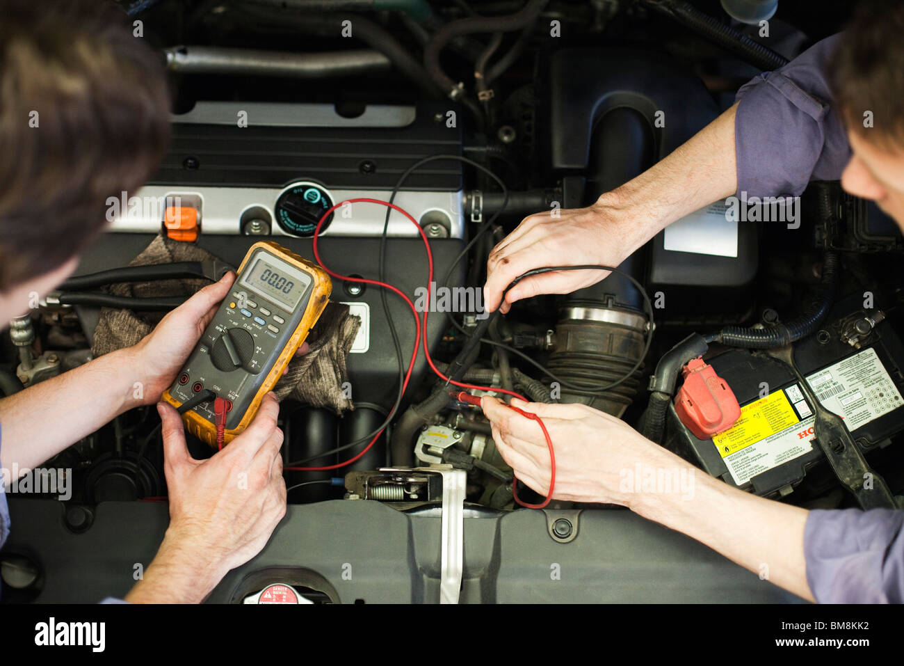 Mechanics tuning car engine Stock Photo Alamy