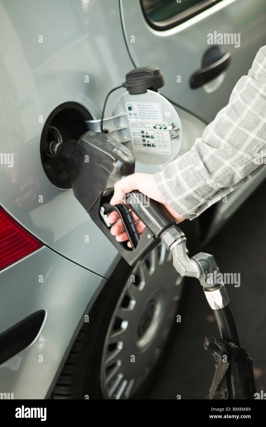 Refueling car at gas station Stock Photo