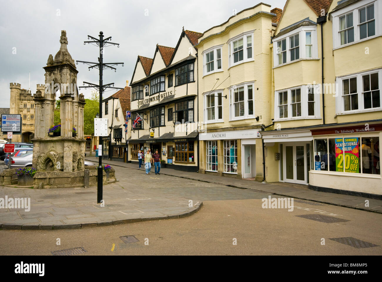 Shops and The Crown Inn High Street Wells Somerset England Stock Photo