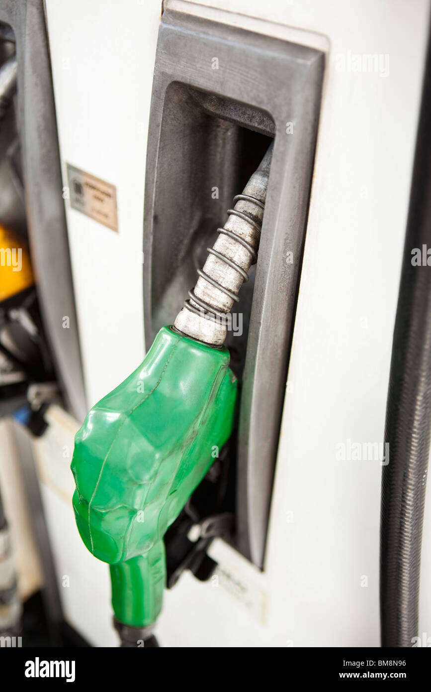 Nozzle in place on gas pump Stock Photo
