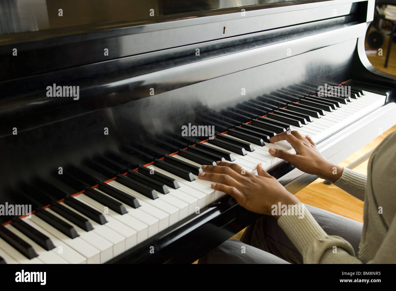 Pianist playing piano Stock Photo