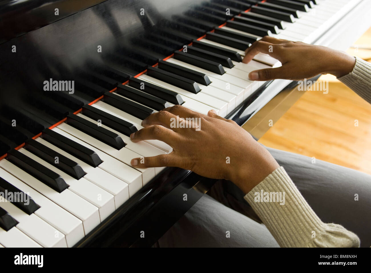 Playing piano Stock Photo