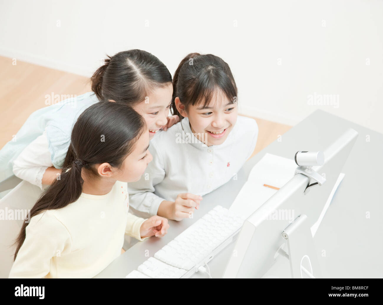 Girls Studying at Desk, Desktop Computer on the Desk Stock Photo - Alamy