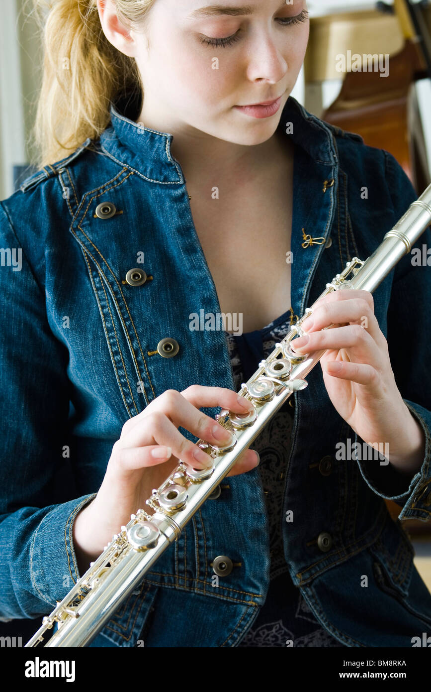 Woman playing flutes hires stock photography and images Alamy
