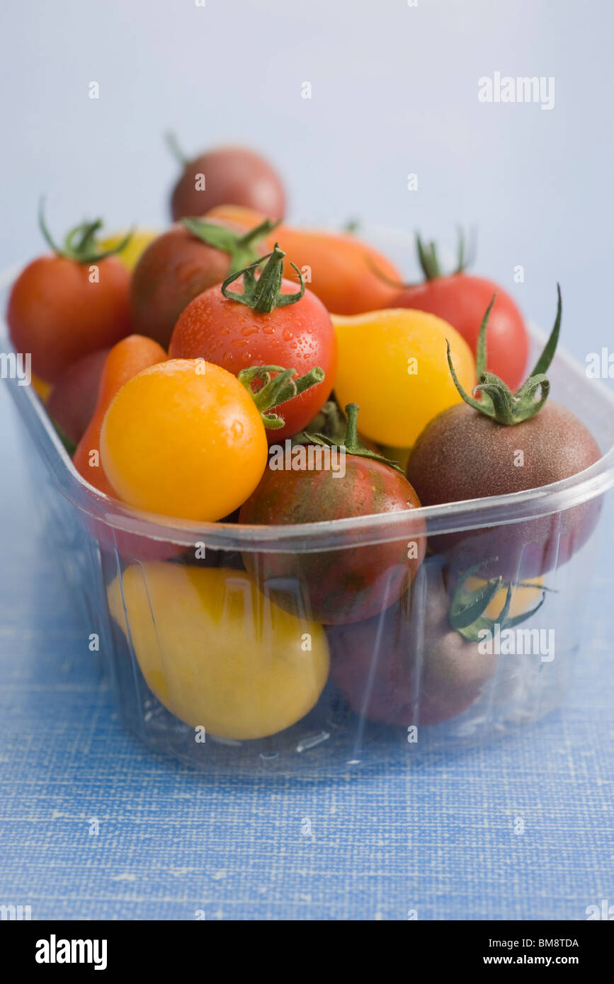 Assorted cherry and plum tomatoes in plastic container Stock Photo Alamy