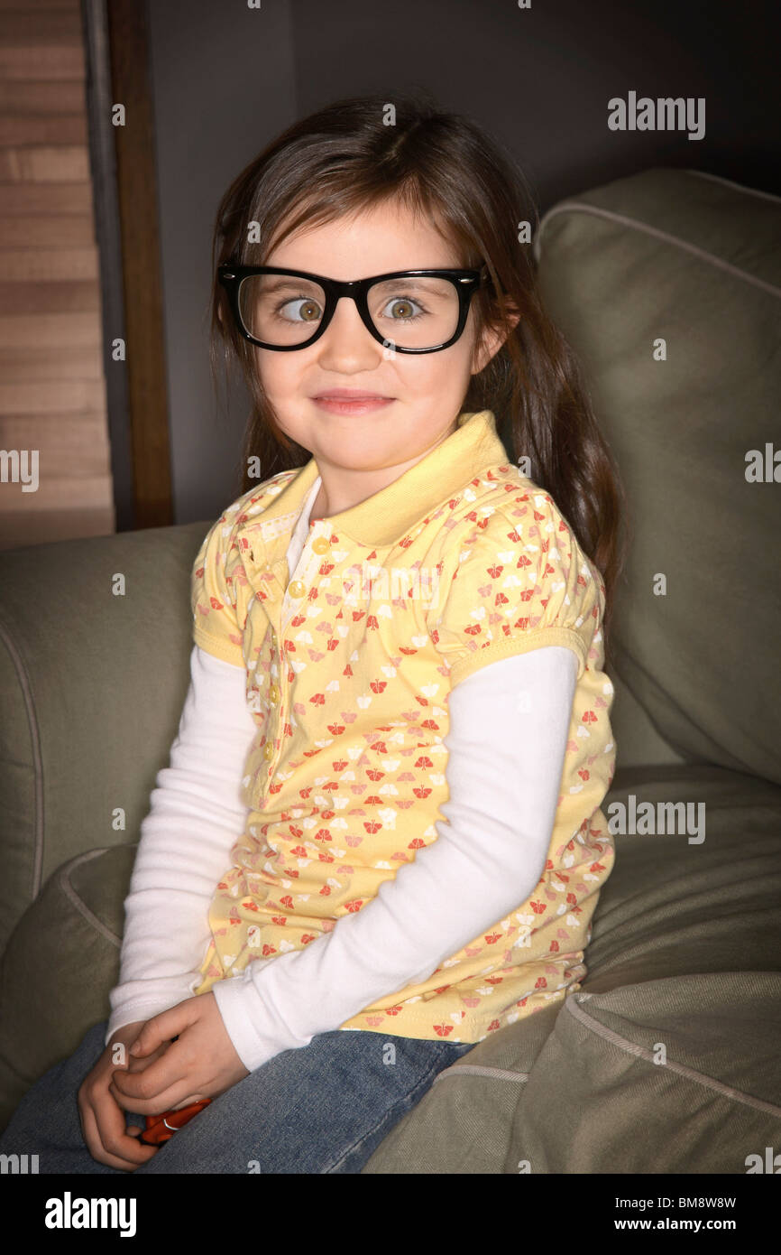 Cross eyed girl wearing glasses hires stock photography and images Alamy