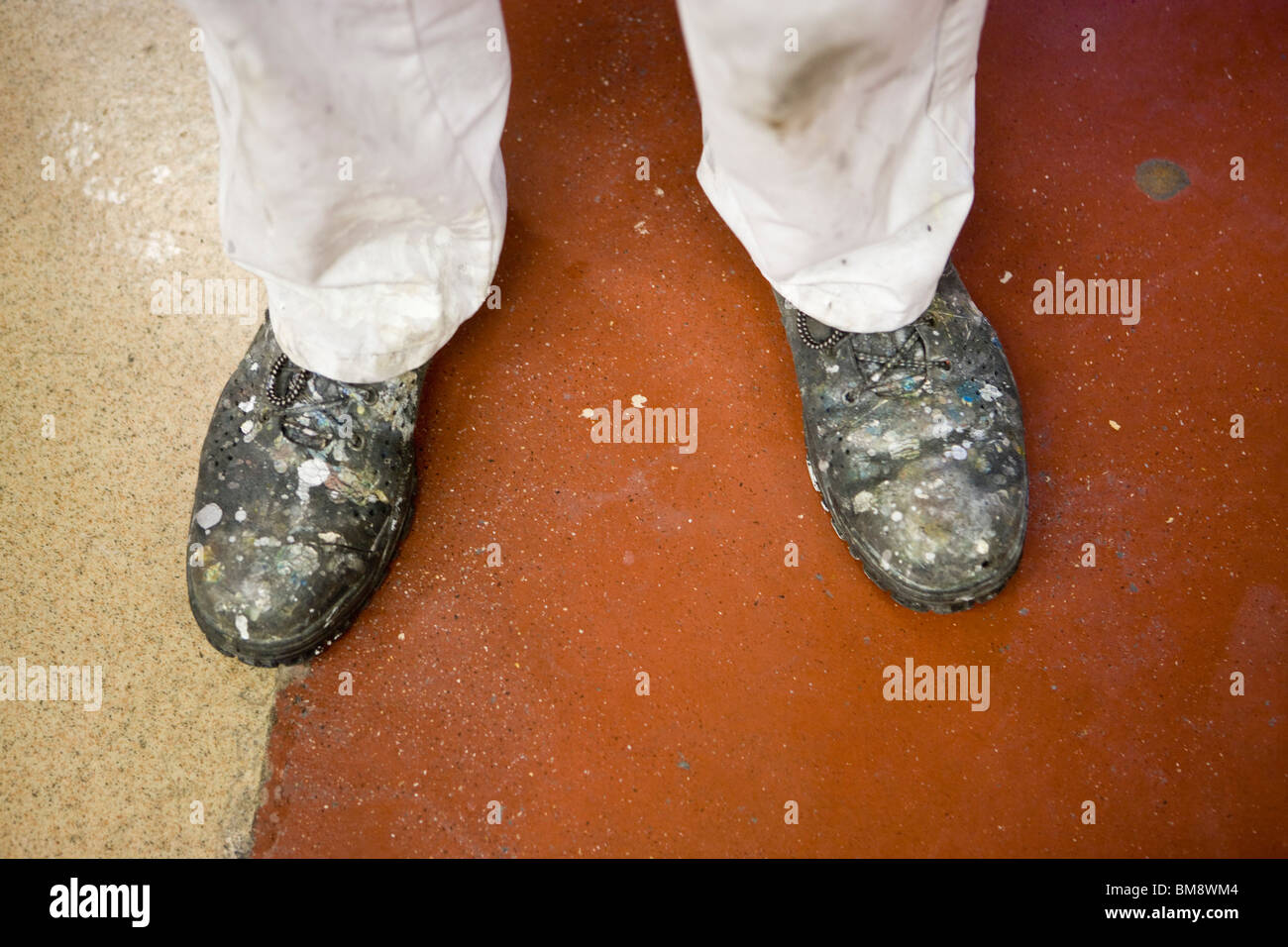 Fabric coating plant, machinist wearing safety boots Stock Photo Alamy
