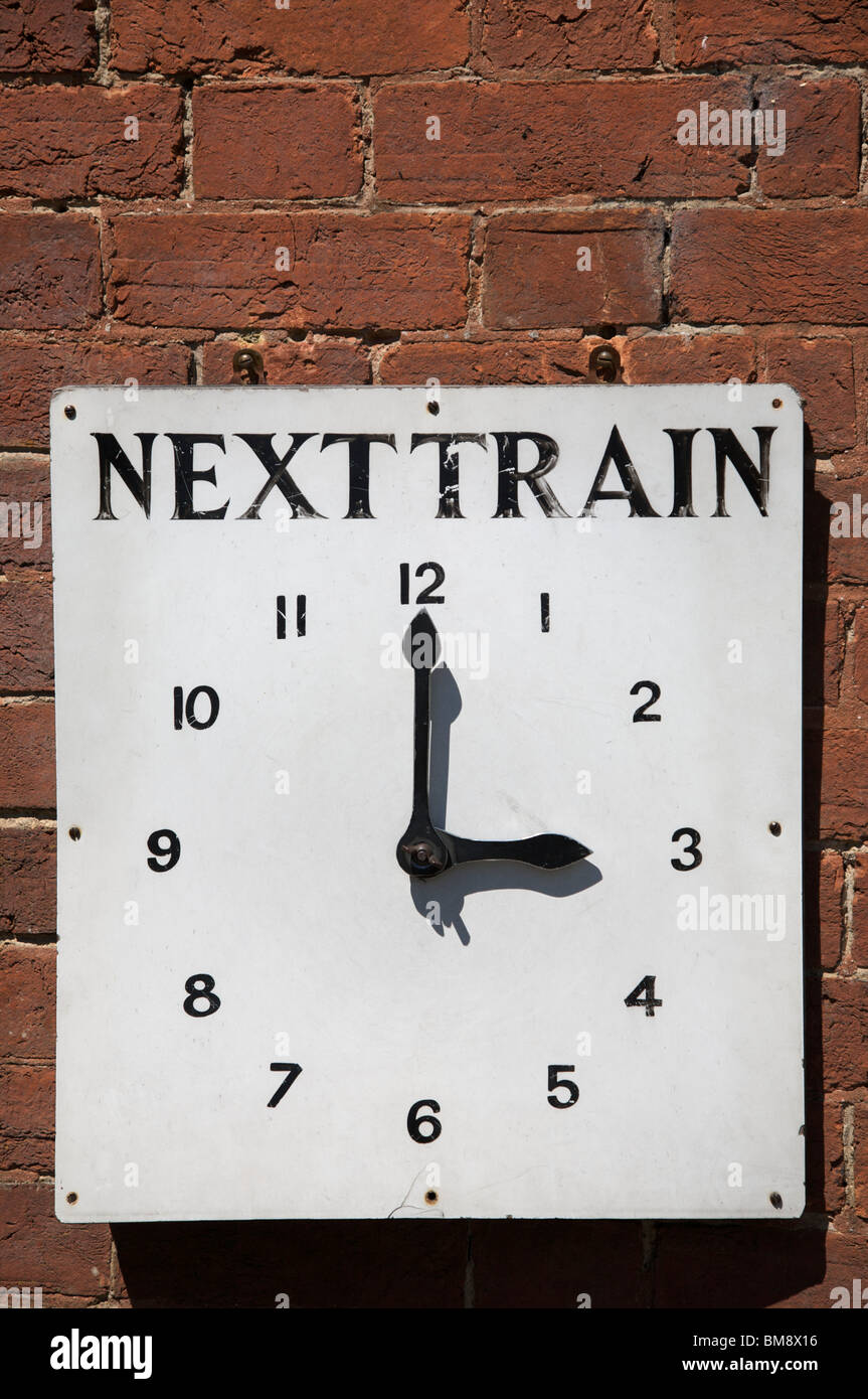 Railway Clock indicating time of next train as Three o'clock Stock ...