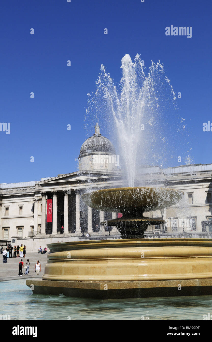 Trafalgar Square fountain and The National Gallery, London, England, UK Stock Photo
