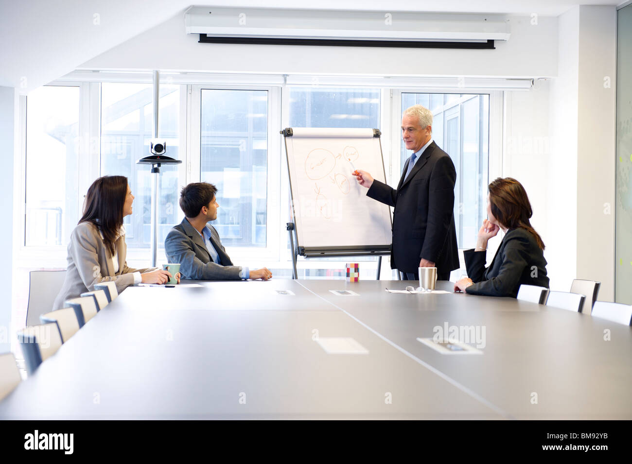 Presentation man suit flip chart hi-res stock photography and images ...