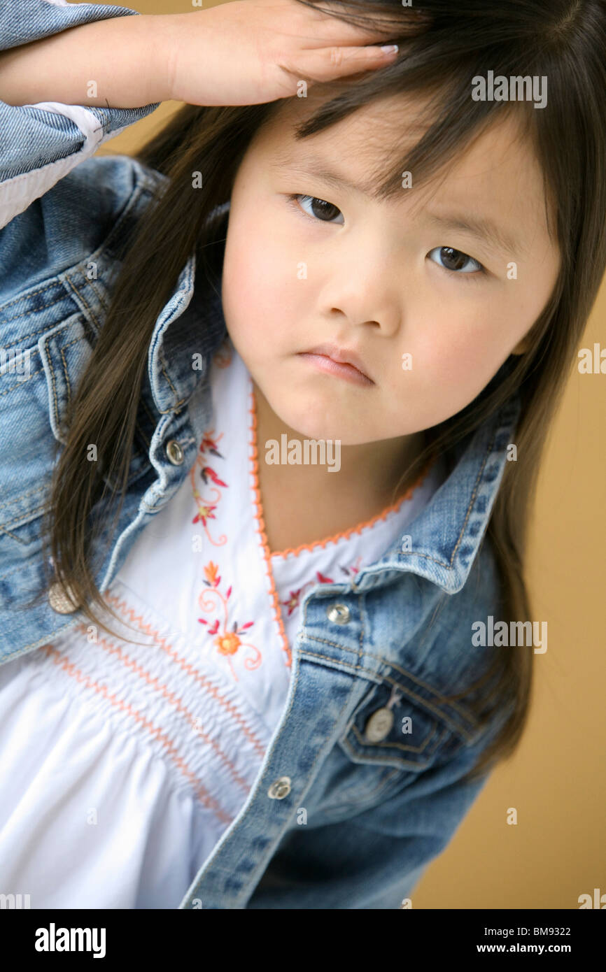 Young Girl Frowning Stock Photo