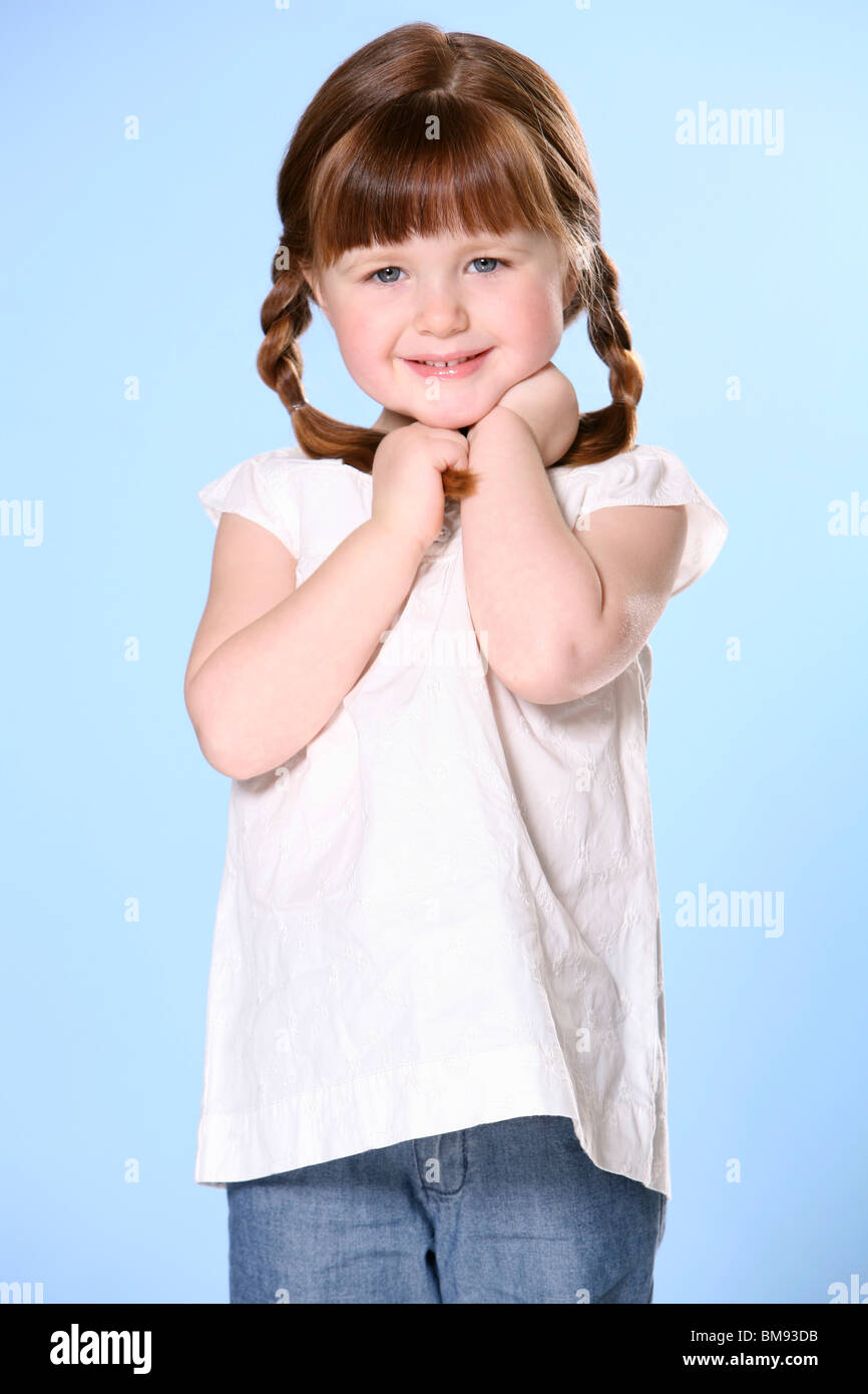 Portrait Of Little Girl With Braids Stock Photo - Alamy