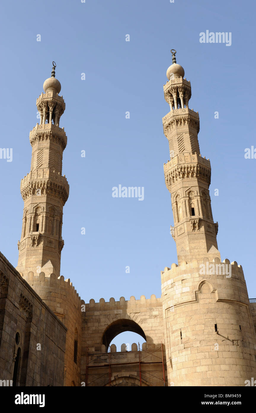 minarets above the towers of Bab Zuwayla,mosque of sultan mu'ayyad shaykh, , al-ghuiyyah, cairo , egypt Stock Photo