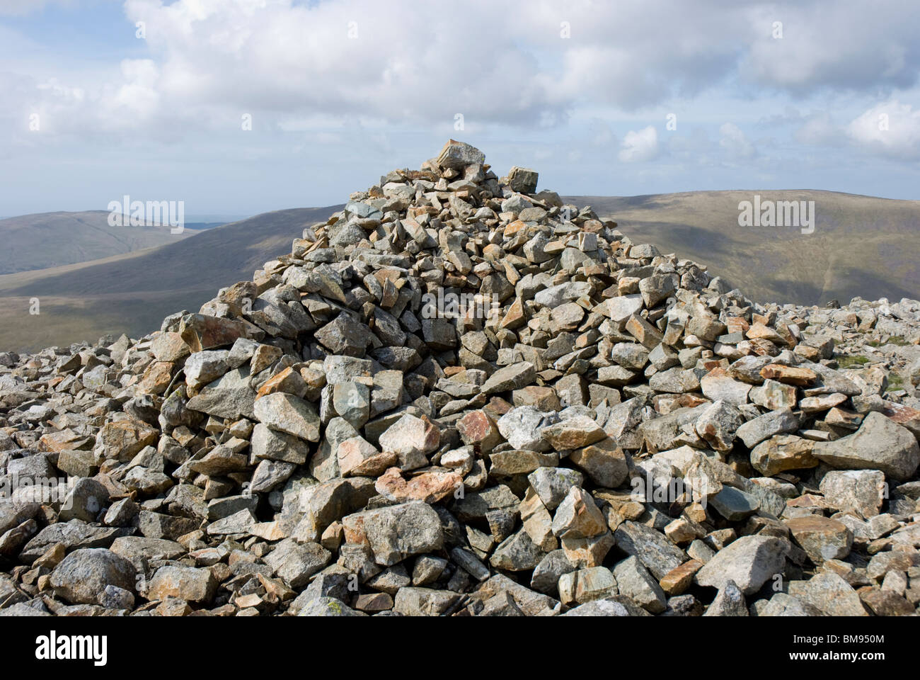 Huge cairn or tumulus on the summit of Seatallan in the Cumbrian Lake District Stock Photo