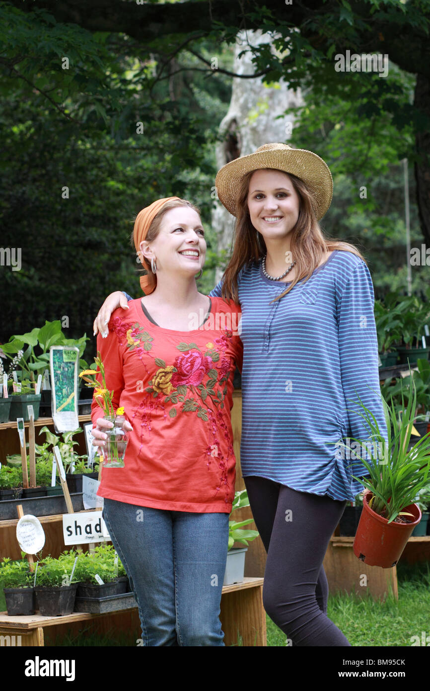 mother daughter at plant sale Stock Photo