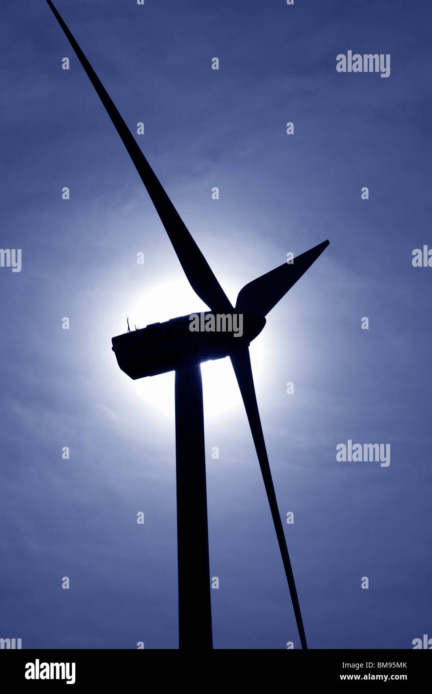 aerogenerator windmill backlight blue sky  Stock Photo