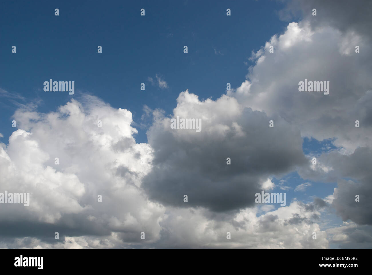 Dramatic dark clouds on the blue sky background Stock Photo - Alamy