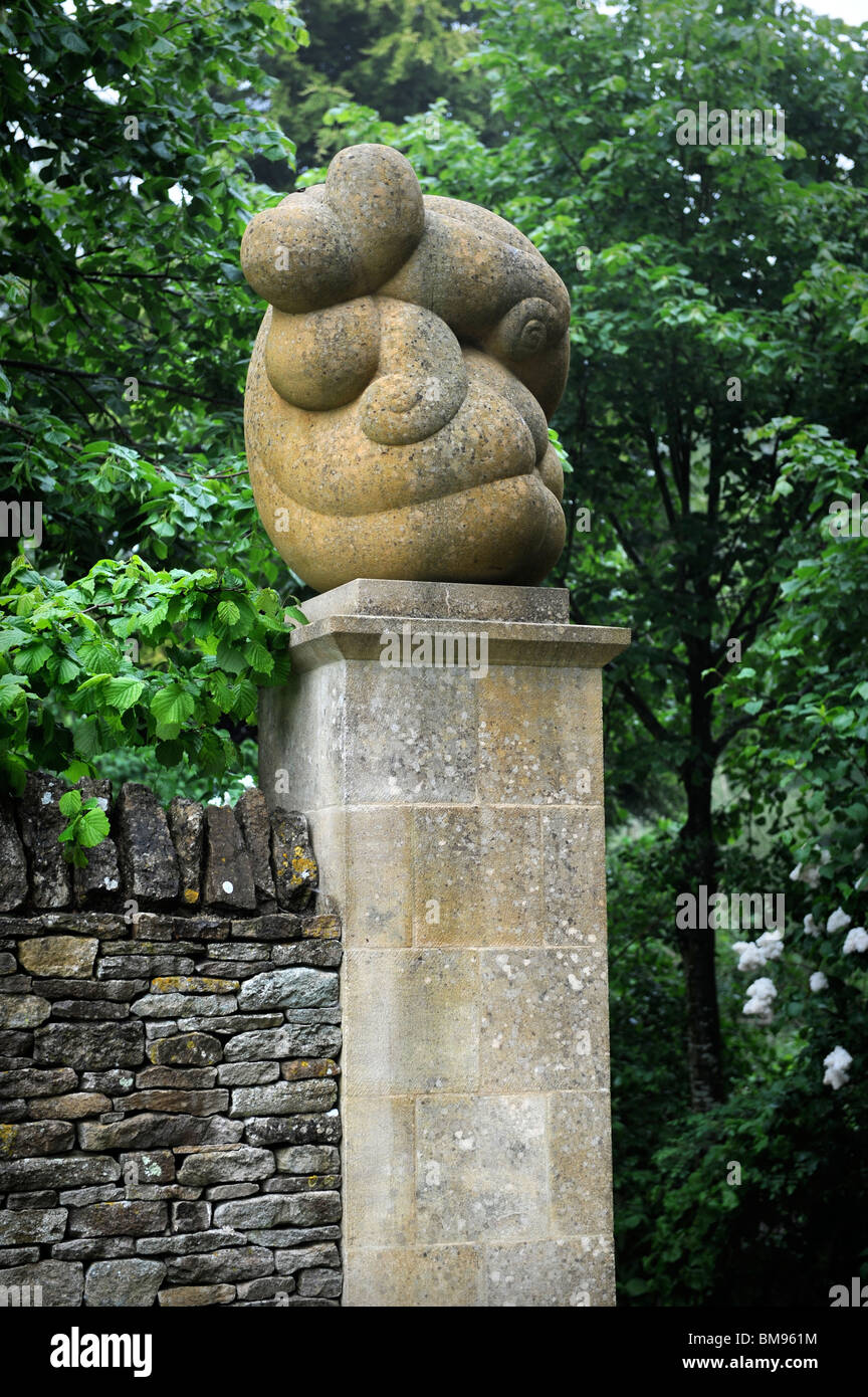 Sculpture exhibition including modern additions to the gateposts at Asthall Manor near Burford, Oxfordshire May 2008 Stock Photo