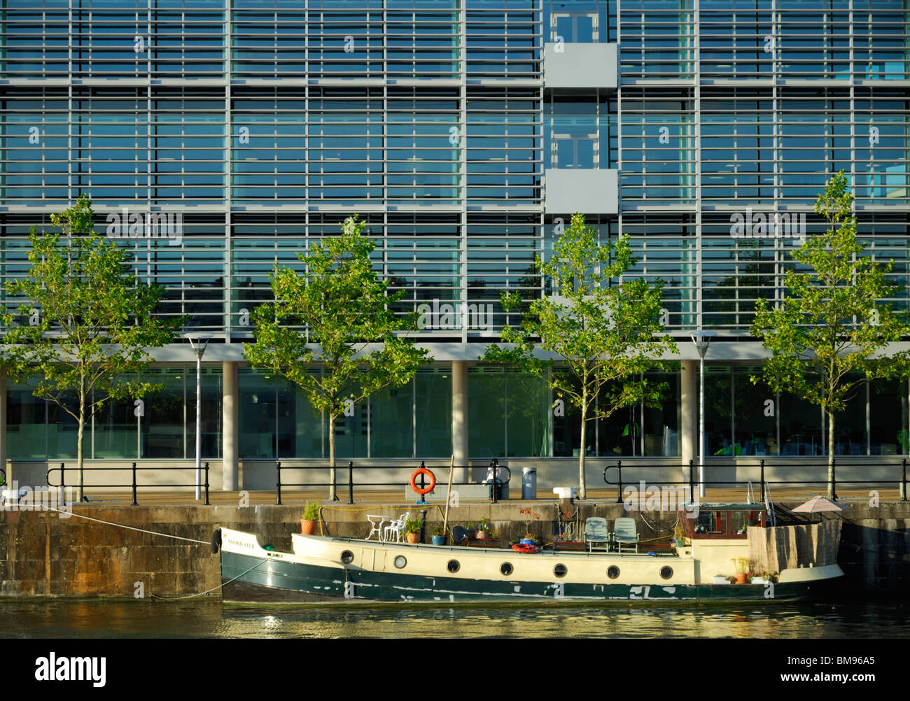 New, modern contemporary offices built on a prime waterfront location as part of a redevelopment of Bristol city old docks. Stock Photo