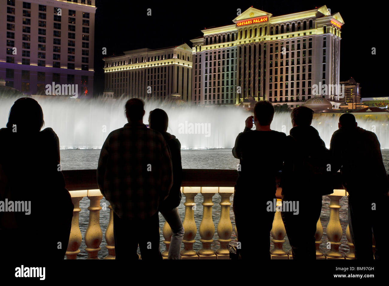 Spectators watching Bellagio Fountain display at night-Las Vegas, Nevada, USA. Stock Photo