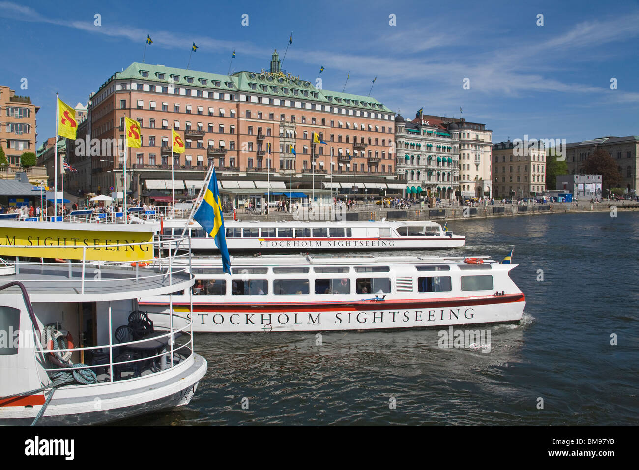 Sightseeing Boats outside the Grand Hotel Stockholm City Sweden Stock