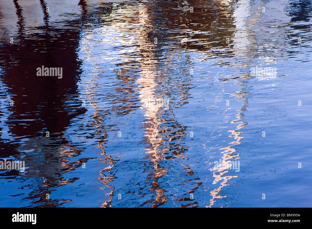 Abstract Reflection of Fishing Boat in Ocean Stock Photo - Alamy