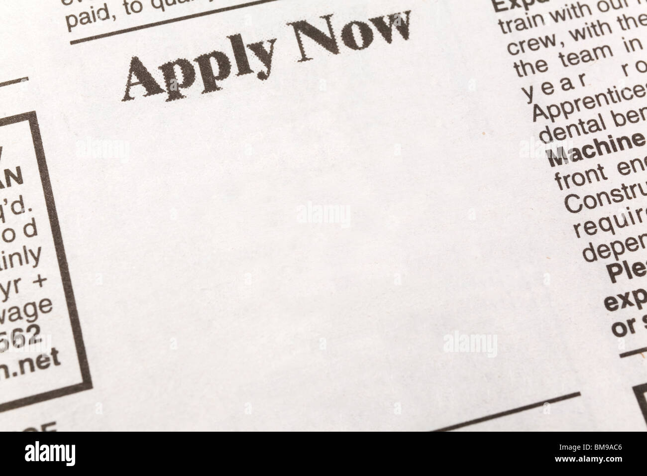 newspaper employment ad, Apply Now, Employment concept Stock Photo Alamy