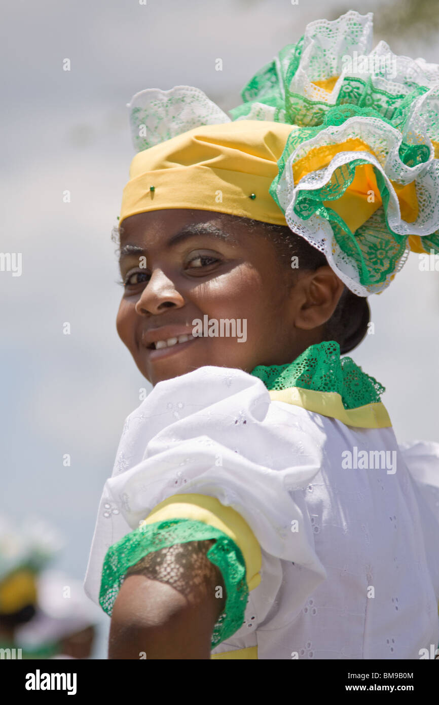 Young girl dressed in colorful costumes dance during Harvest Festival, Willemstad, Curacao, Netherlands Antilles, Caribbean Stock Photo