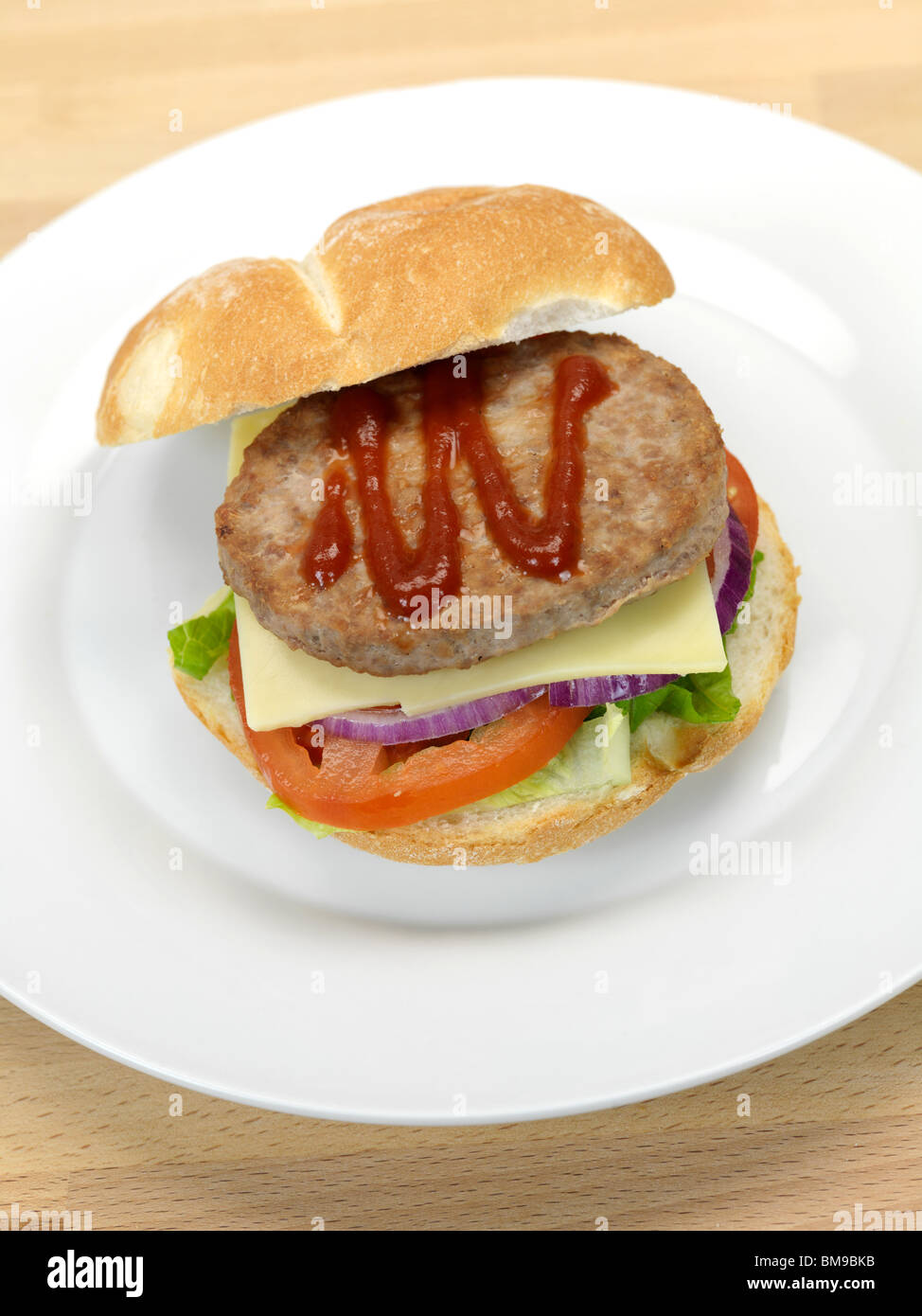 A freshly made American style hamburger with sauce Stock Photo Alamy