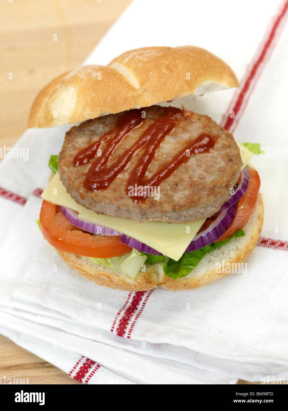 A freshly made American style hamburger with sauce Stock Photo Alamy