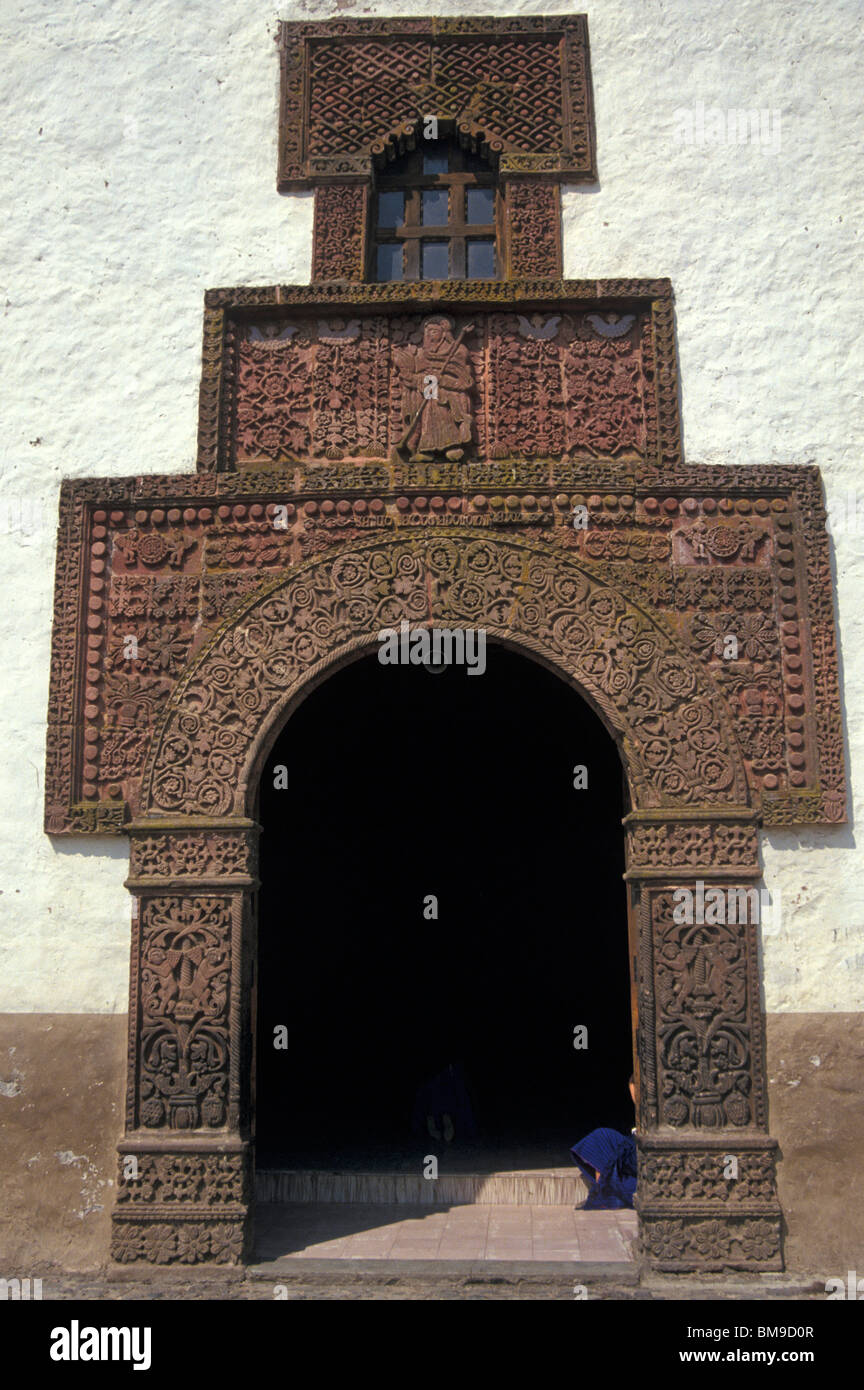 Moorish designs on the facade of the 16th-century Iglesia de Santiago Apostol in the village of Angahuan, Michoacan, Mexico Stock Photo