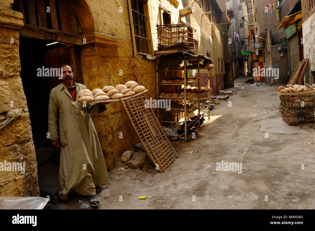 fresh egyptian bread(eesh baladi) , back streets of islamic cairo Stock