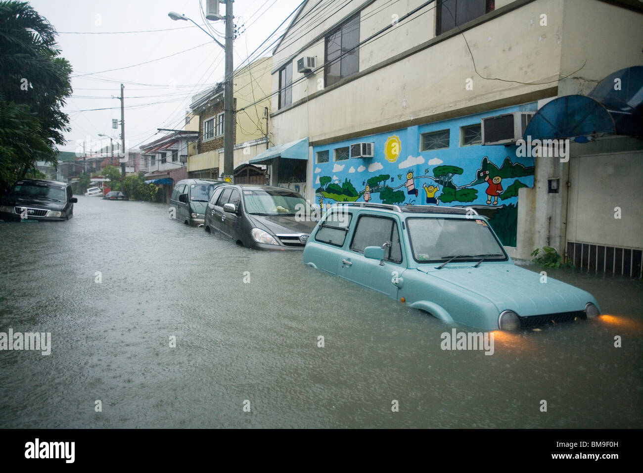 submerged cars in flood water Stock Photo